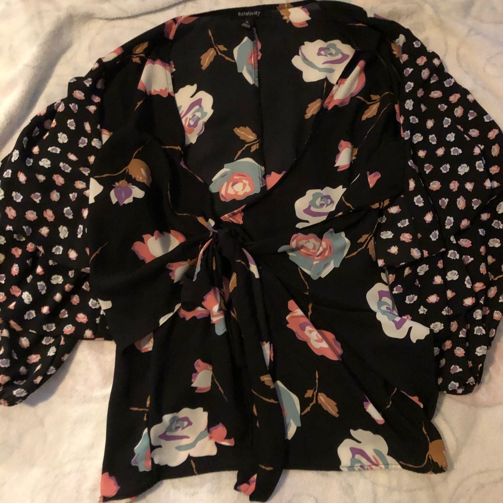 Wrap like top with ruffled sleeves